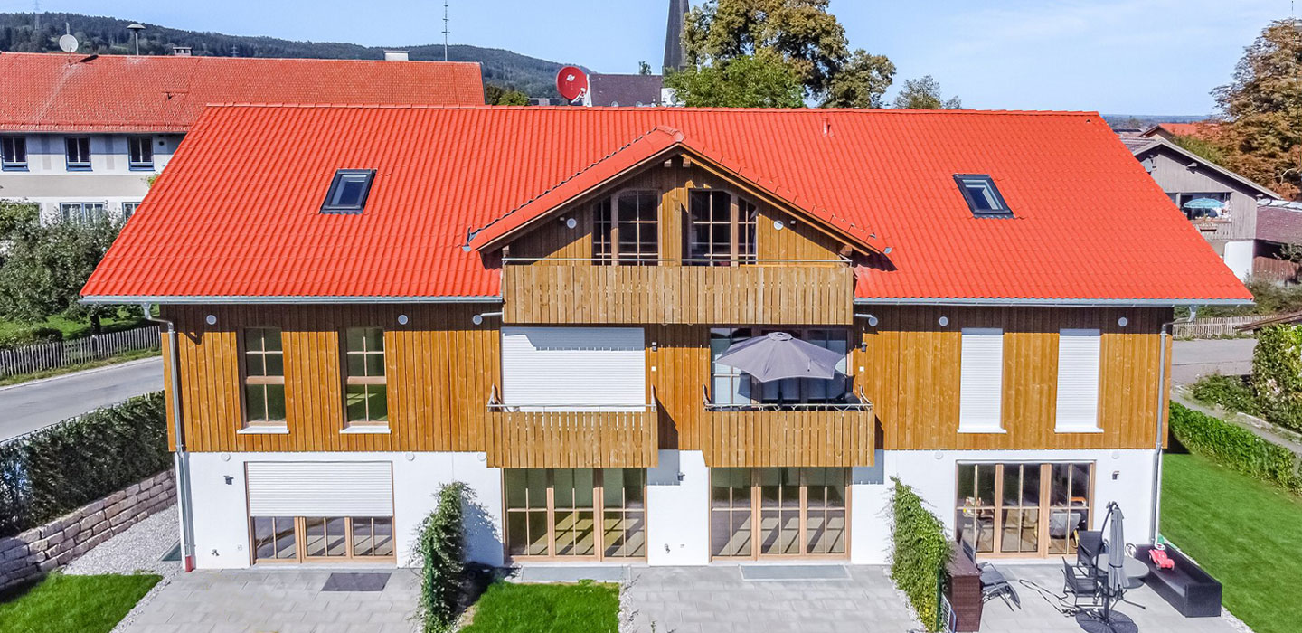 Mehrfamilienhaus und Doppelhaus